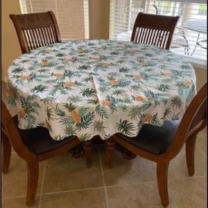 Round 50 inch pineapple and palm tablecloth